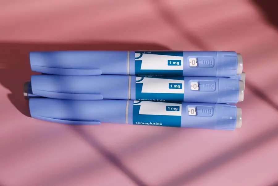 3 weight loss injections on a pink surface