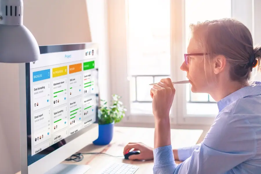 SMB Owner with a digital kanban