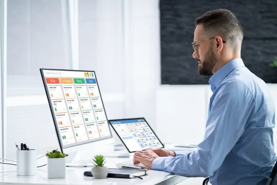Scrum Master at work tracking Kanban metrics